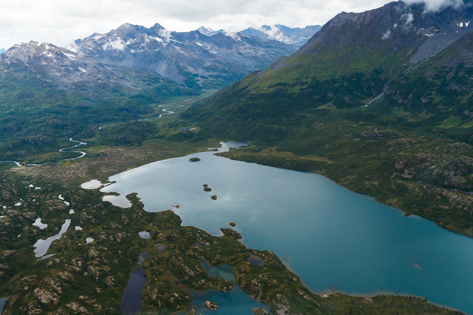 mountains and valley with water